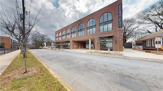 view of road featuring sidewalks and curbs