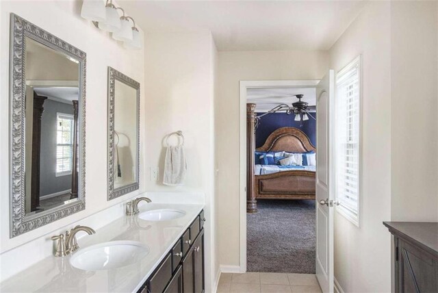 bathroom featuring vanity, ceiling fan, and tile patterned flooring