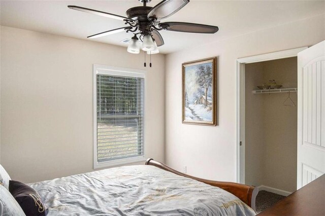 bedroom featuring a closet and ceiling fan