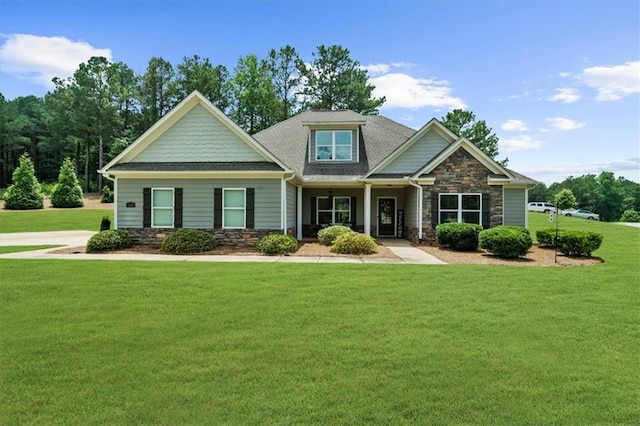 1212 Chapman Grove Ln, Monroe, GA 30656 - craftsman house featuring stone siding and a front yard