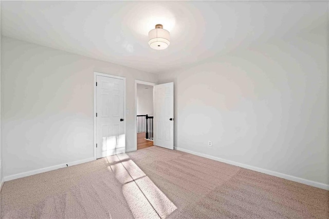 139 Thunder Ridge Ln, Acworth, GA 30101 - unfurnished bedroom with carpet floors and baseboards