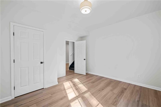 139 Thunder Ridge Ln, Acworth, GA 30101 - unfurnished bedroom featuring wood finished floors and baseboards