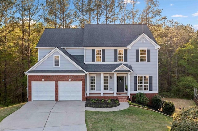 139 Thunder Ridge Ln, Acworth, GA 30101 - traditional home with covered porch, concrete driveway, brick siding, a front yard, and roof with shingles