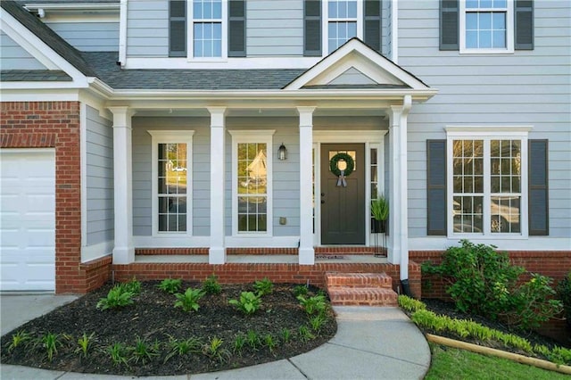 139 Thunder Ridge Ln, Acworth, GA 30101 - property entrance with a porch, brick siding, and roof with shingles