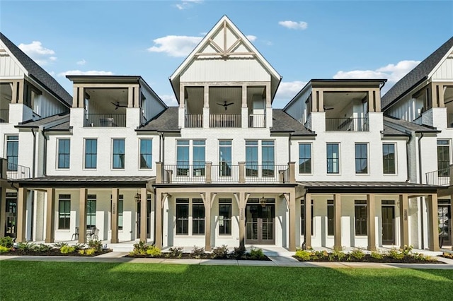 12632 Branyan Cir, Alpharetta, GA 30004 - rear view of house featuring a ceiling fan, a balcony, a yard, and a shingled roof