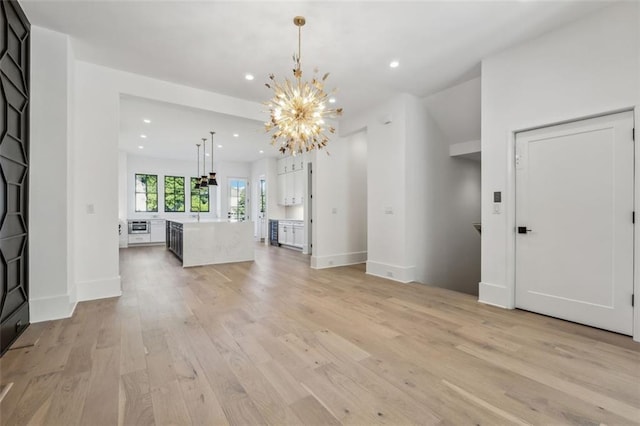 12632 Branyan Cir, Alpharetta, GA 30004 - entrance foyer with a chandelier, light wood finished floors, and recessed lighting