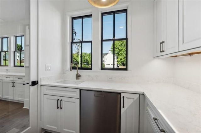 12632 Branyan Cir, Alpharetta, GA 30004 - kitchen featuring stainless steel dishwasher, plenty of natural light, and wood finished floors