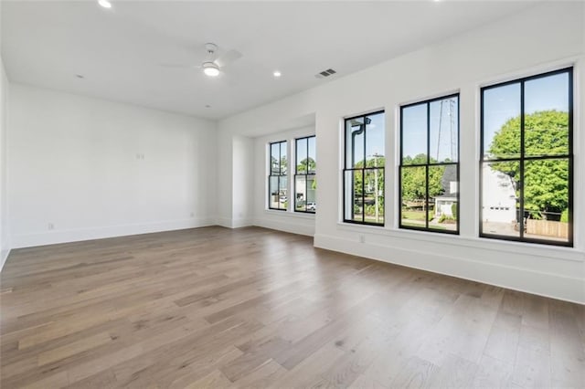 12632 Branyan Cir, Alpharetta, GA 30004 - unfurnished room featuring ceiling fan, wood finished floors, and recessed lighting