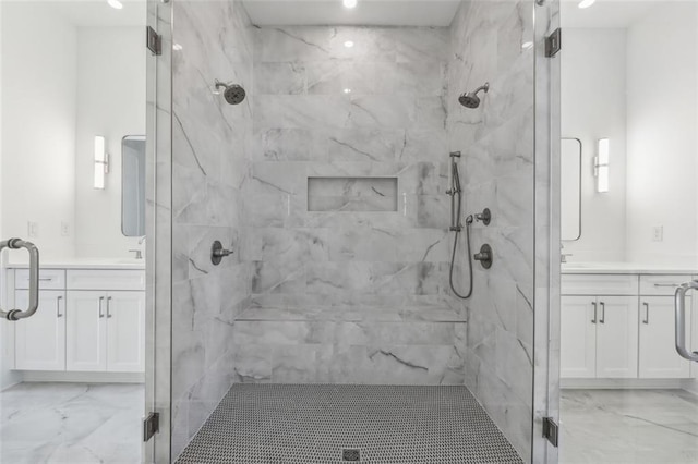 12632 Branyan Cir, Alpharetta, GA 30004 - bathroom featuring marble look tiles, a marble finish shower, vanity, and recessed lighting