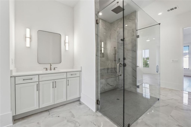 12632 Branyan Cir, Alpharetta, GA 30004 - full bathroom featuring marble tiled floors, a marble finish shower, and vanity