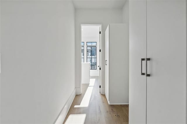12632 Branyan Cir, Alpharetta, GA 30004 - corridor featuring light wood-style floors and baseboards