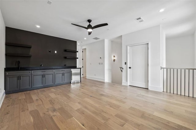 12632 Branyan Cir, Alpharetta, GA 30004 - unfurnished living room with light wood-style flooring, recessed lighting, and ceiling fan