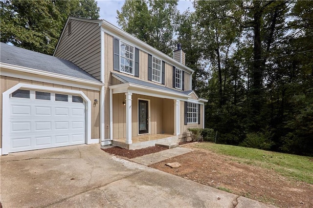 colonial-style house with a garage