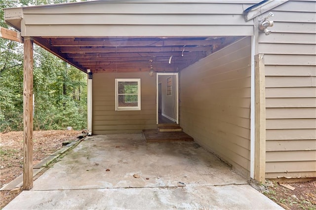 exterior space with a carport