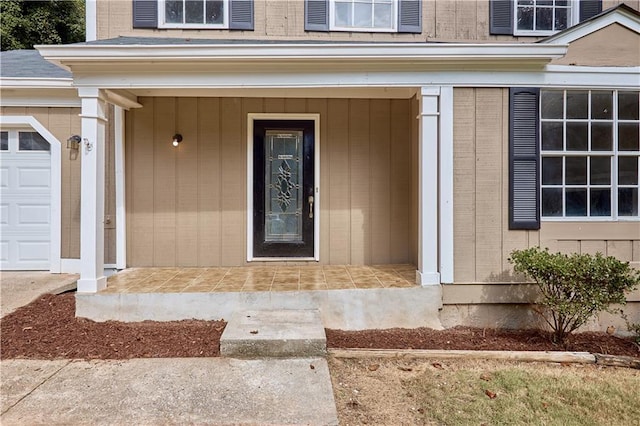 property entrance with a garage