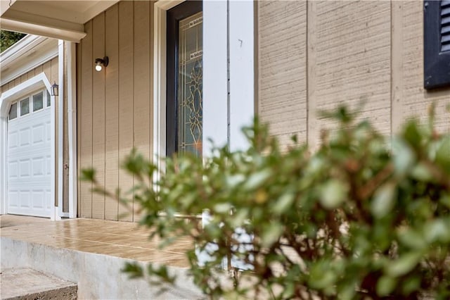 entrance to property with a garage