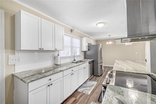 kitchen with dishwasher, electric stove, wood finished floors, white cabinets, and a sink