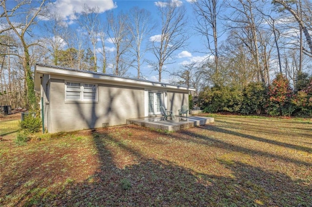 view of yard featuring french doors