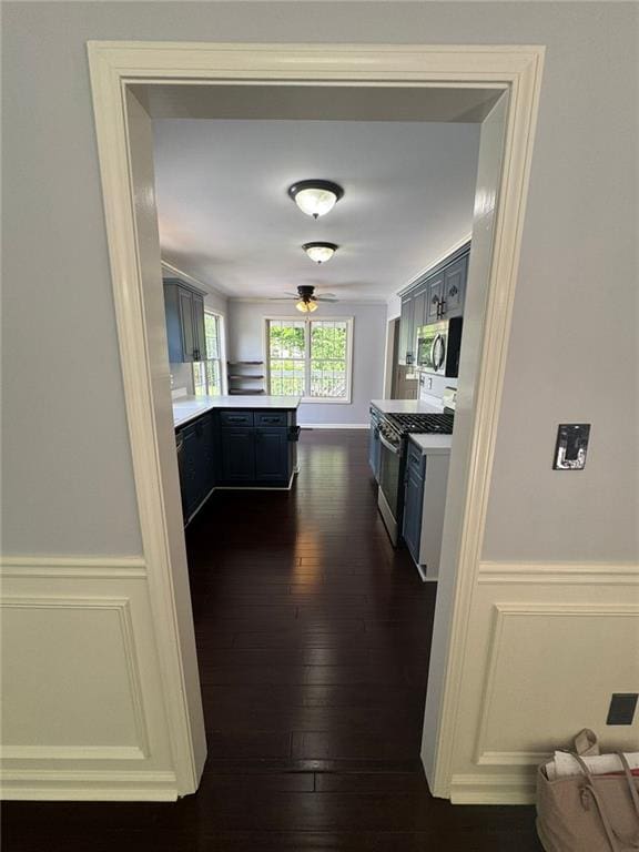 955 Tributary Way, Dacula, GA 30019 - hall with dark wood-style flooring and wainscoting