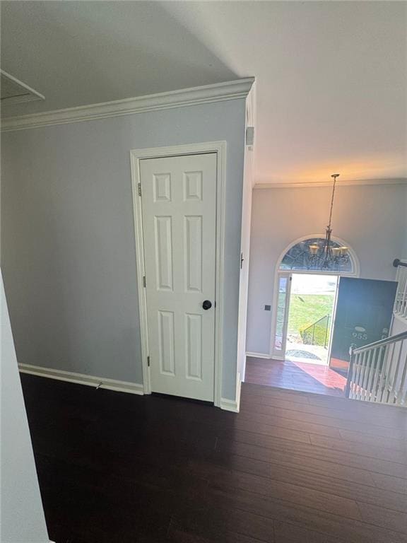 955 Tributary Way, Dacula, GA 30019 - unfurnished room with ornamental molding and dark wood-style floors