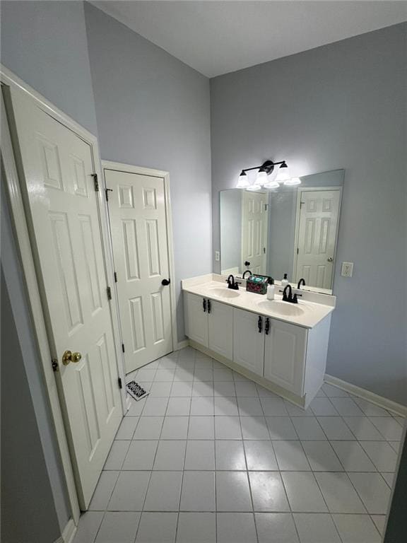 955 Tributary Way, Dacula, GA 30019 - bathroom featuring tile patterned flooring and double vanity