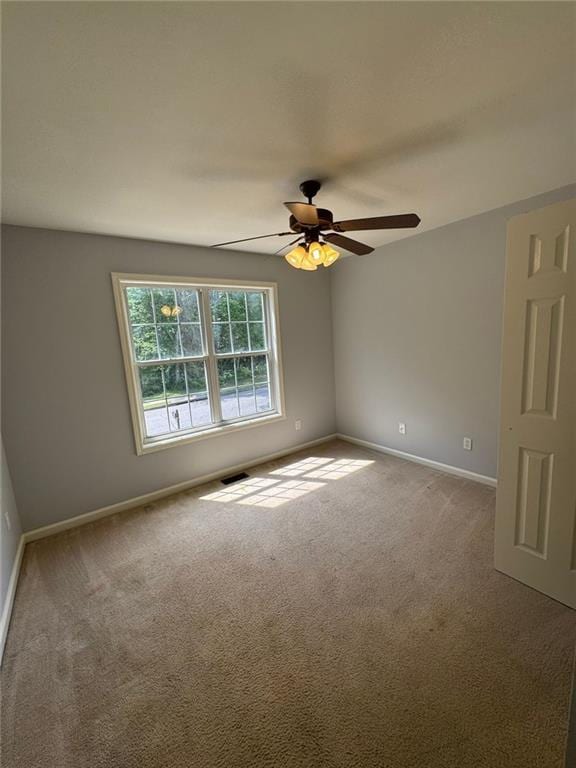 955 Tributary Way, Dacula, GA 30019 - empty room with carpet floors and a ceiling fan