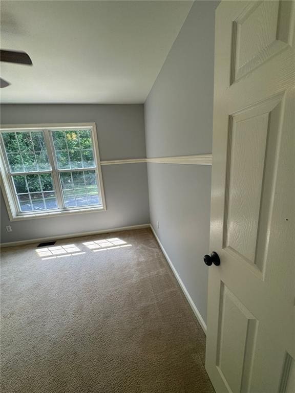 955 Tributary Way, Dacula, GA 30019 - carpeted spare room featuring baseboards and a ceiling fan