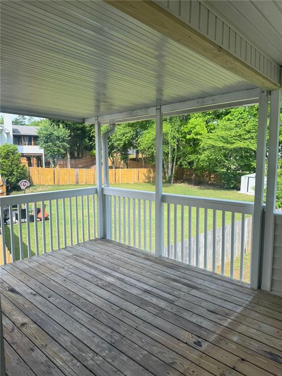 955 Tributary Way, Dacula, GA 30019 - deck with a fenced backyard