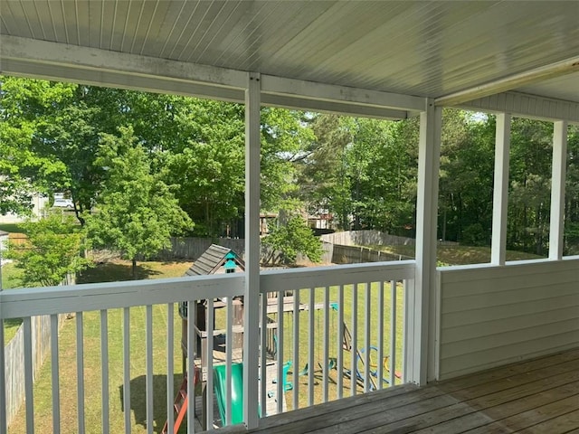 955 Tributary Way, Dacula, GA 30019 - wooden deck with a fenced backyard and view of scattered trees