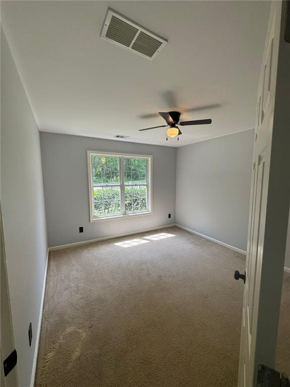 955 Tributary Way, Dacula, GA 30019 - carpeted spare room featuring baseboards and ceiling fan