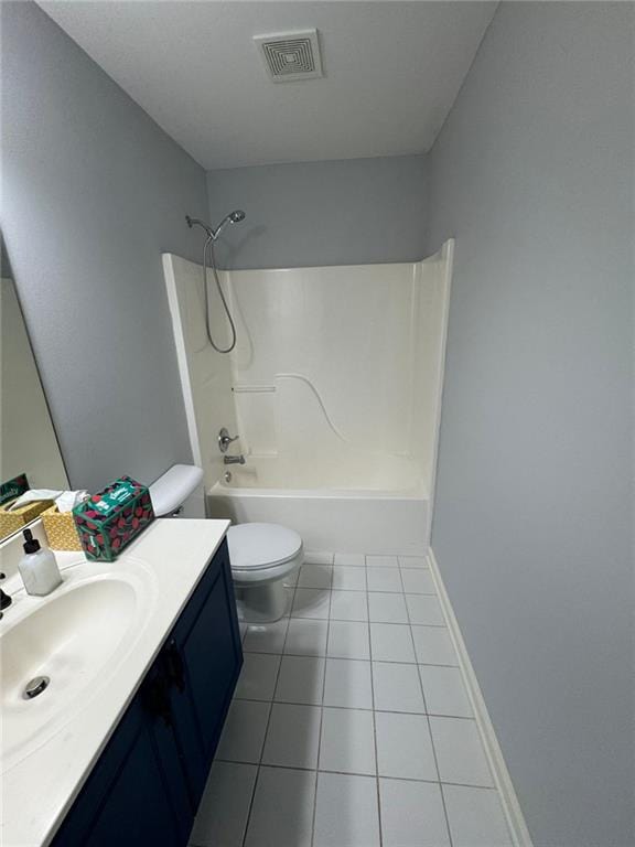 955 Tributary Way, Dacula, GA 30019 - bathroom featuring vanity, tile patterned floors, and shower / washtub combination