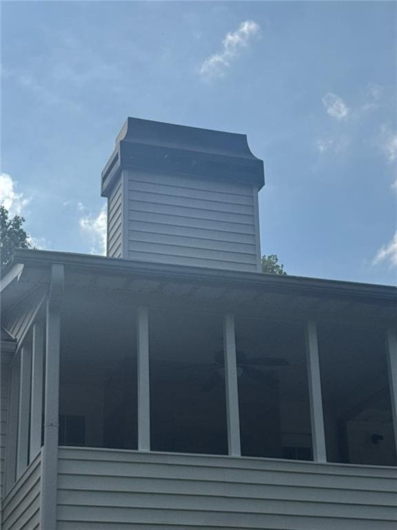 955 Tributary Way, Dacula, GA 30019 - view of side of property with a sunroom