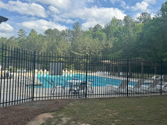 955 Tributary Way, Dacula, GA 30019 - community pool featuring a patio