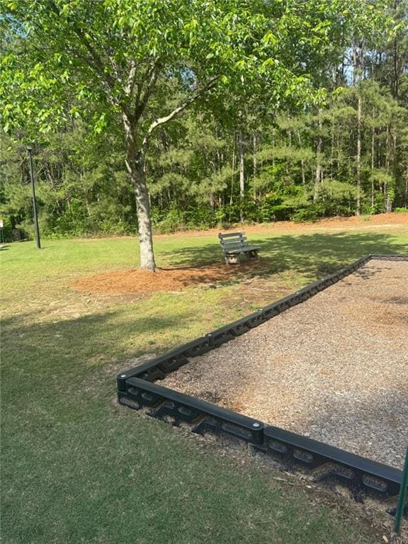 955 Tributary Way, Dacula, GA 30019 - view of green lawn with a game area