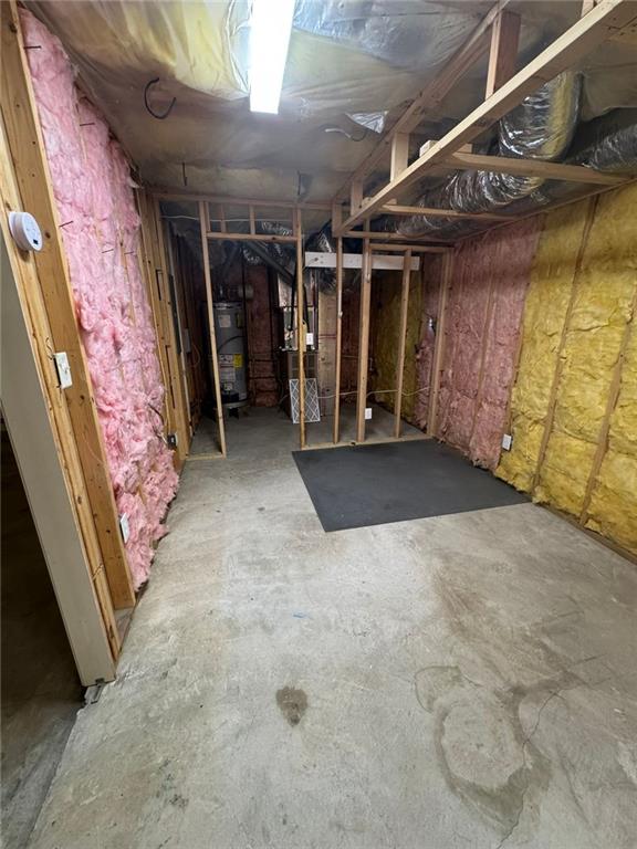 955 Tributary Way, Dacula, GA 30019 - unfinished basement featuring gas water heater