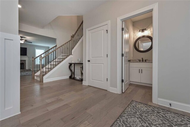 interior space featuring sink and light hardwood / wood-style floors