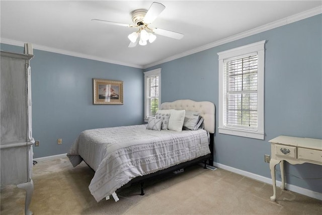 bedroom featuring ornamental molding, light carpet, ceiling fan, and baseboards