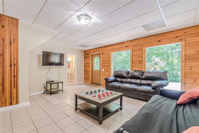 45 Chestatee River Rdg NE, Dahlonega, GA 30533 - living area with wood walls, light tile patterned flooring, baseboards, and a drop ceiling