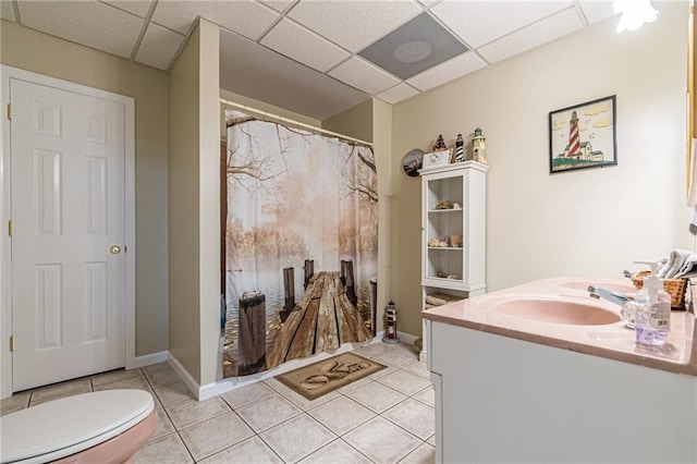 45 Chestatee River Rdg NE, Dahlonega, GA 30533 - bathroom featuring tile patterned floors, vanity, toilet, a paneled ceiling, and curtained shower
