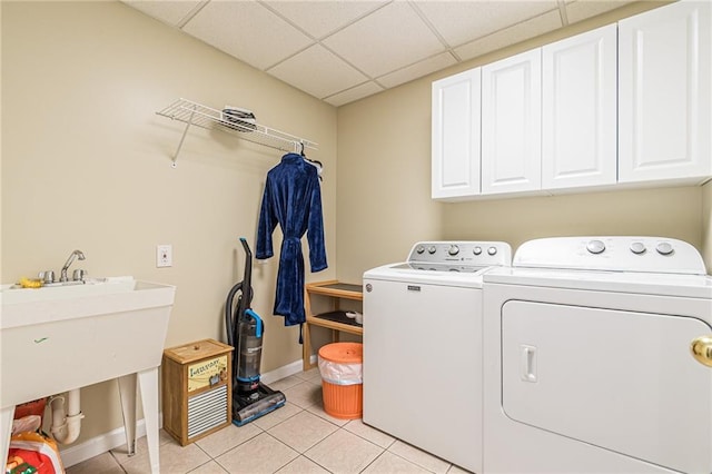 45 Chestatee River Rdg NE, Dahlonega, GA 30533 - laundry area with cabinet space, separate washer and dryer, light tile patterned flooring, and baseboards