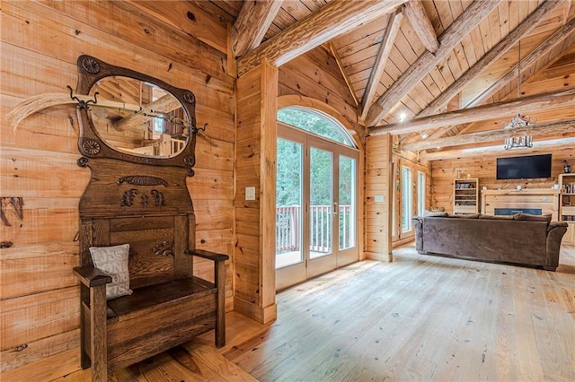 45 Chestatee River Rdg NE, Dahlonega, GA 30533 - doorway featuring wood ceiling with exposed beams, wooden walls, hardwood / wood-style floors, high vaulted ceiling, and french doors