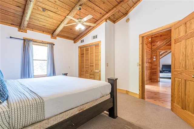 45 Chestatee River Rdg NE, Dahlonega, GA 30533 - carpeted bedroom featuring wooden ceiling with exposed beams, a ceiling fan, a closet, baseboards, and high vaulted ceiling