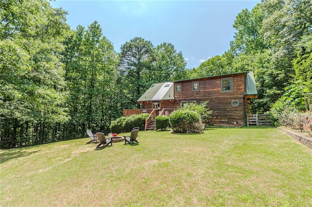 45 Chestatee River Rdg NE, Dahlonega, GA 30533 - back of property with a yard, an outdoor fire pit, a deck, and stairway