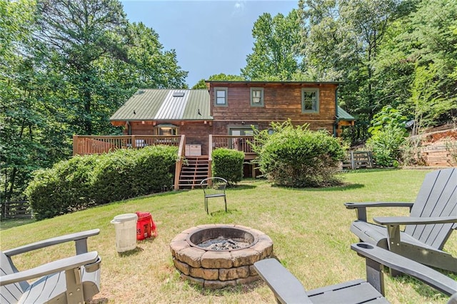 45 Chestatee River Rdg NE, Dahlonega, GA 30533 - view of green lawn with a fire pit, a wooden deck, and stairs