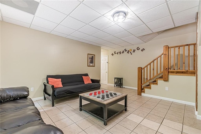 45 Chestatee River Rdg NE, Dahlonega, GA 30533 - living area with light tile patterned floors, stairway, a paneled ceiling, and baseboards