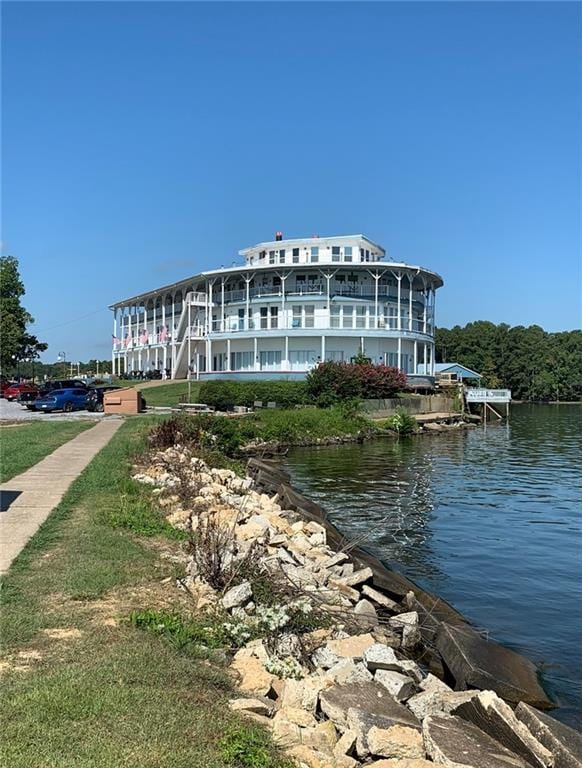 view of building exterior with a water view