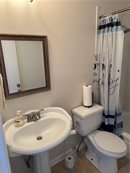 102 Cedar Chase Rd, Atlanta, GA 30324 - full bathroom featuring tile patterned flooring, shower / bath combination with curtain, toilet, and sink