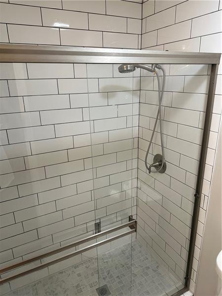 102 Cedar Chase Rd, Atlanta, GA 30324 - bathroom with a shower with shower door