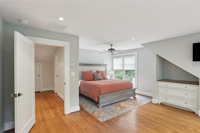 bedroom with light wood-type flooring, baseboards, a ceiling fan, and recessed lighting