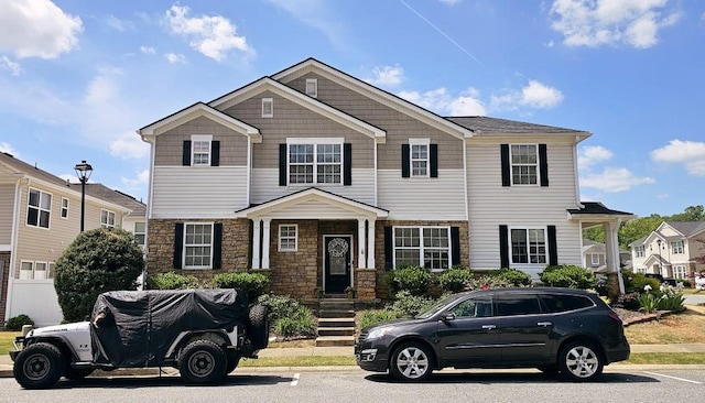 view of front facade featuring stone siding